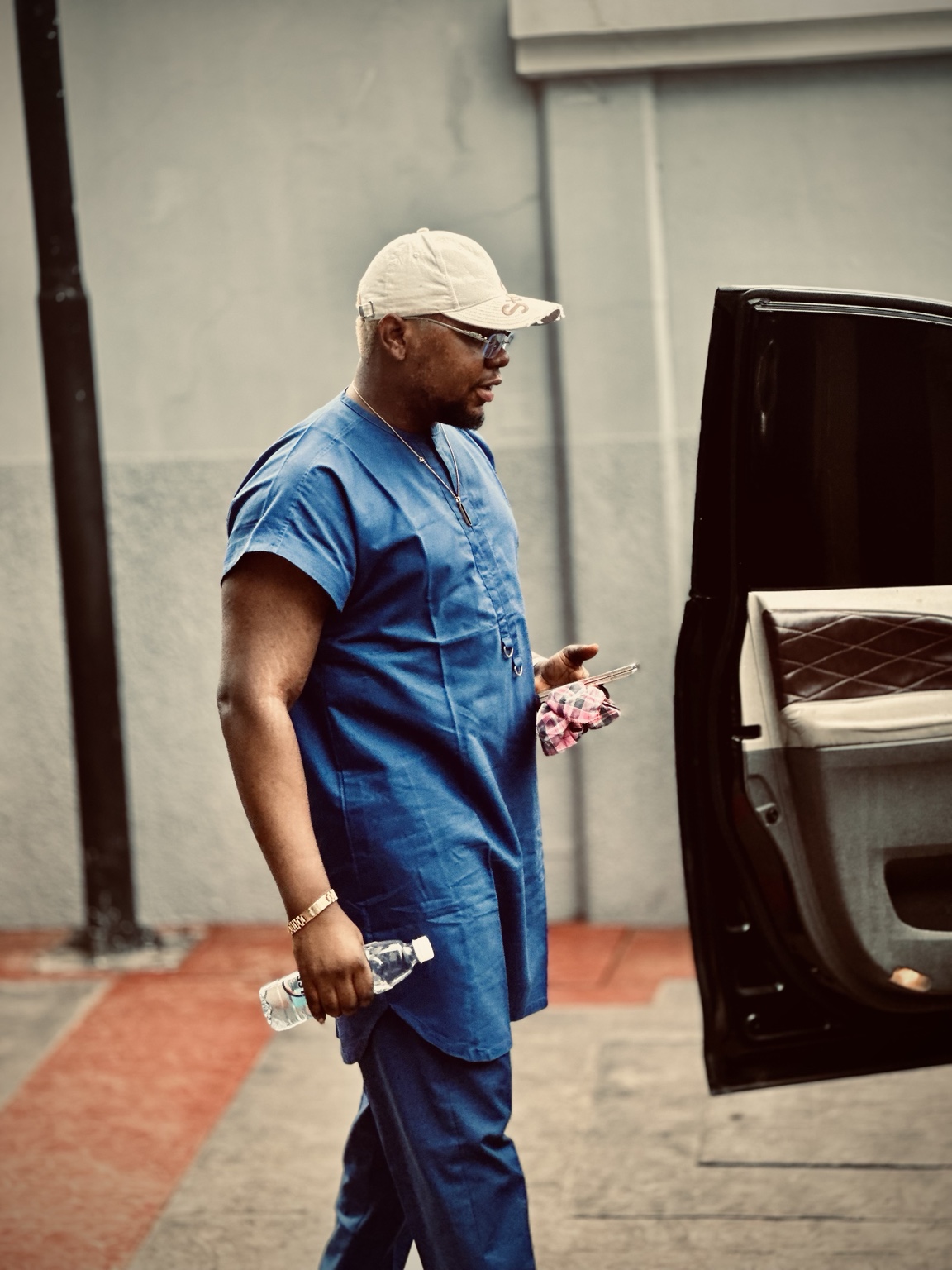 Ciphervenom outdoors in blue traditional attire